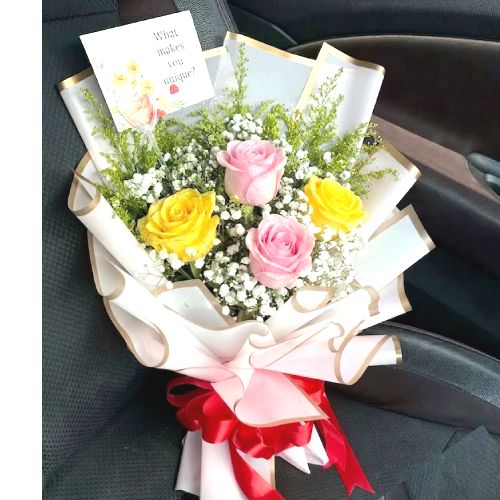 2 pink roses 2 yellow roses bouquet